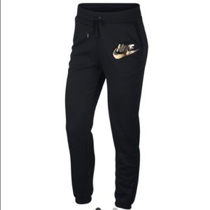 black and gold nike jumpsuit